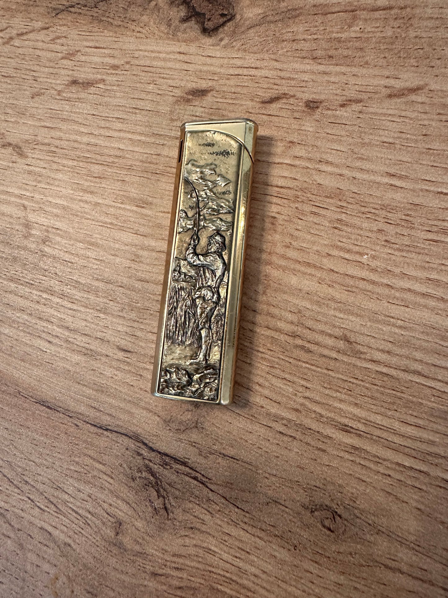 Vintage Flamex Toronado Lighter Featuring Raised Fly Fisherman 3" Gold Tone