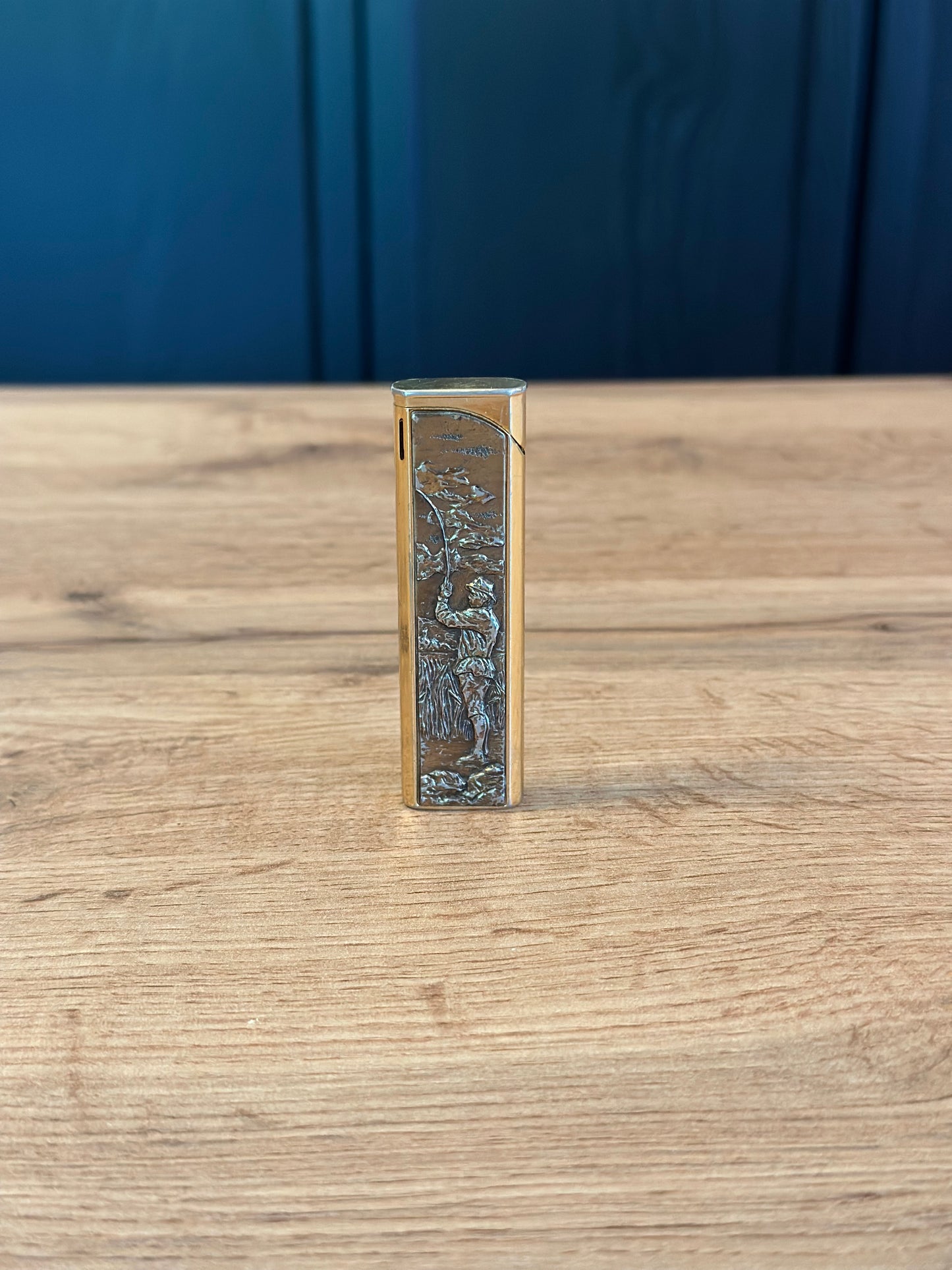Vintage Flamex Toronado Lighter Featuring Raised Fly Fisherman 3" Gold Tone